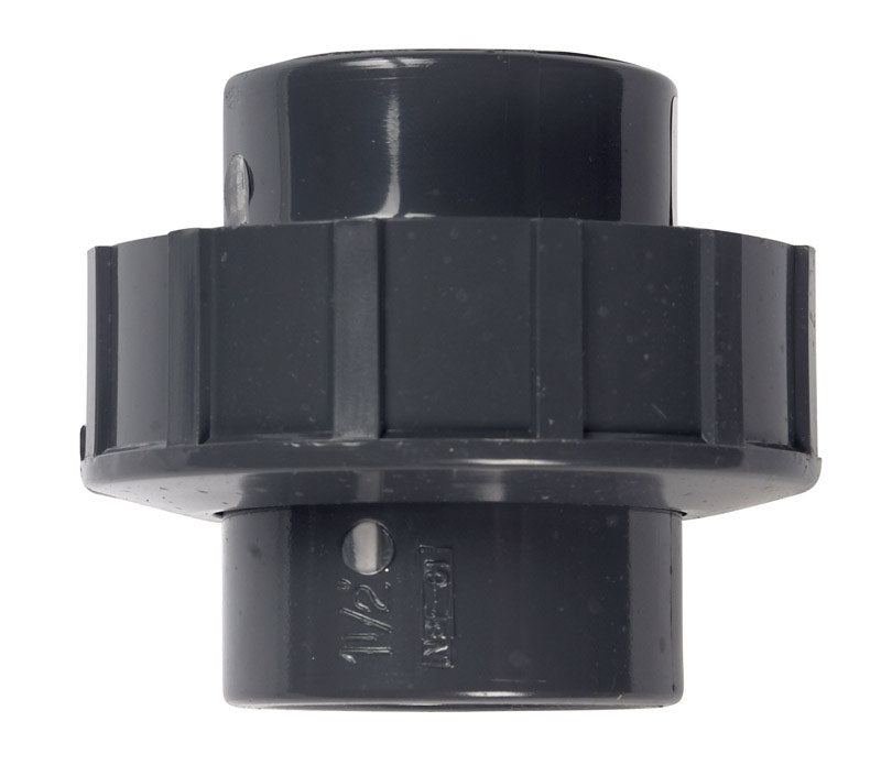 PVC SCH80 1.5-inch union fitting by Emery Jensen, showing the white PVC union with threaded ends for Schedule 80 piping.