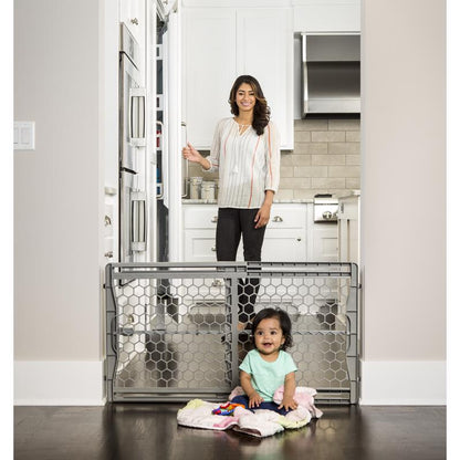 Gray 42-inch safety gate by Emery Jensen, made of plastic, designed to secure doorways and stairways for child safety.