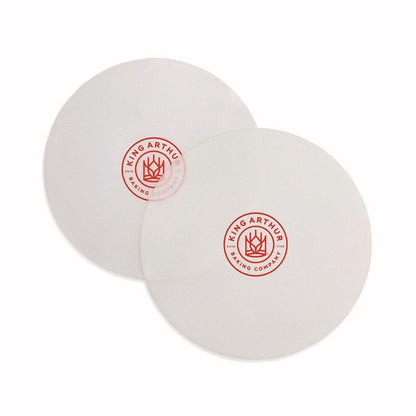 Emery Jensen 9-inch round silicone bakeware pan for baking cakes and desserts, flexible and heat-resistant silicone material.