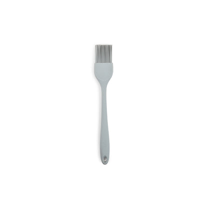 Emery Jensen silicone basting brush with a black handle and flexible silicone bristles for even coating and easy cleaning.
