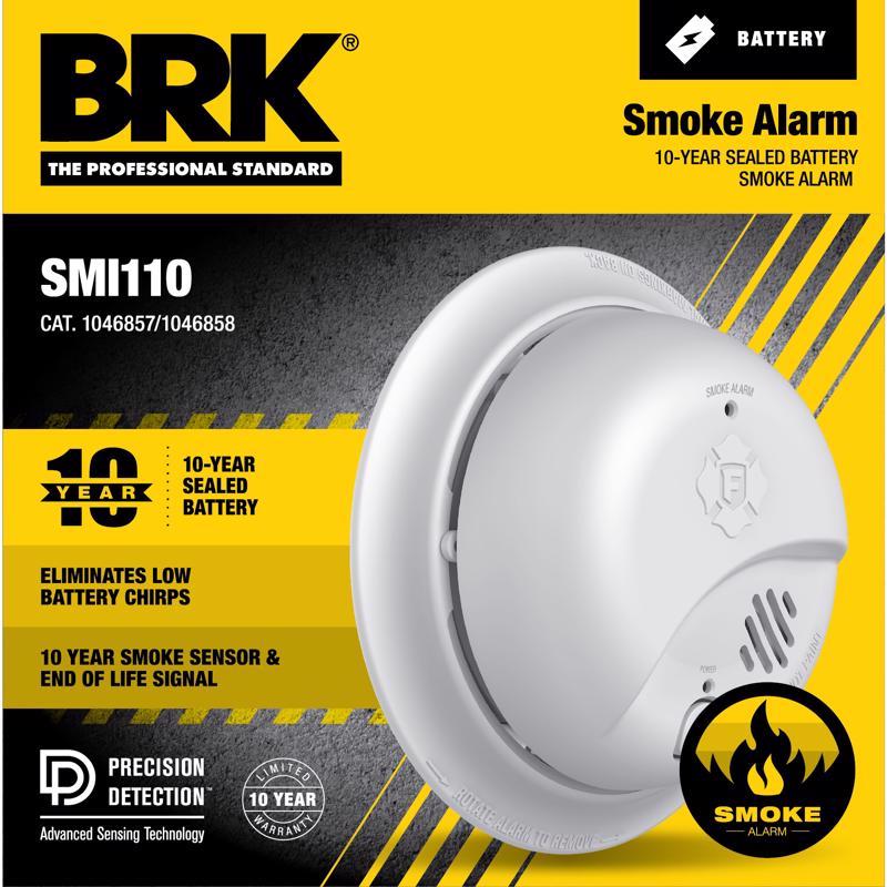 Emery Jensen smoke detector SMK ALRM 10YR SEAL 0827B with a white circular design and test button on the front.