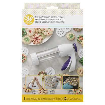 Emery Jensen 13-piece cookie press set with assorted specialty accessories for baking and decorating cookies.