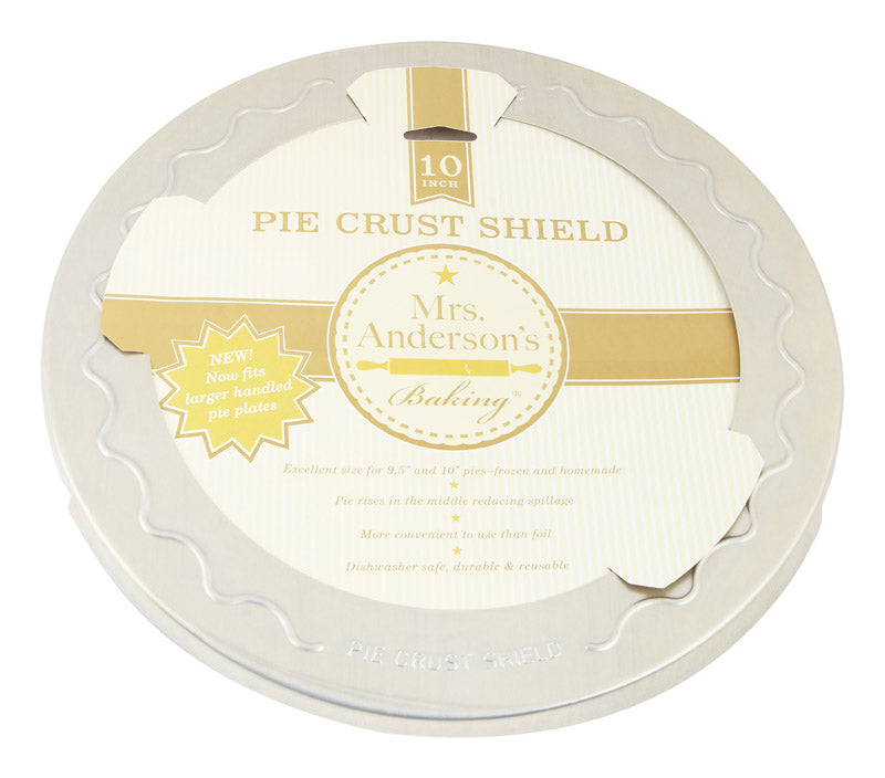 Emery Jensen Shield Pie Crust Saver protecting a pie crust from burns and overbaking in a kitchen oven.