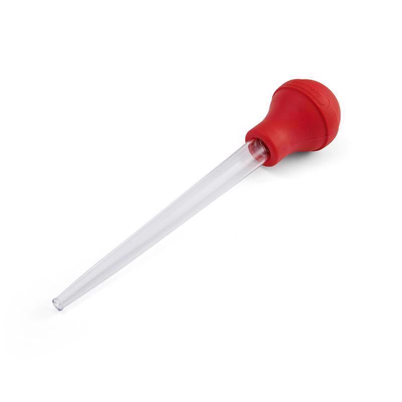 Red plastic rubber silicone BASTER specialty gadget by Emery Jensen, shown in a close-up image highlighting its textured surface.