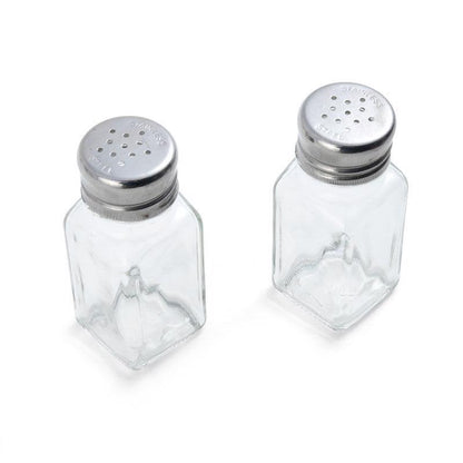 Emery Jensen salt and pepper shakers in clear glass, compact specialty gadgets with a modern design.