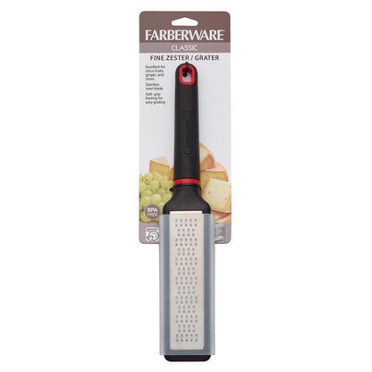 Black and silver Emery Jensen zester grater, a specialty kitchen gadget for zesting citrus and grating spices.
