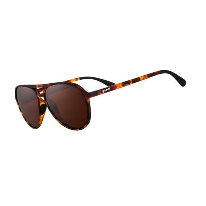 Emery Jensen sports sunglasses with black frame and tinted lenses, designed for outdoor activities and sun protection.
