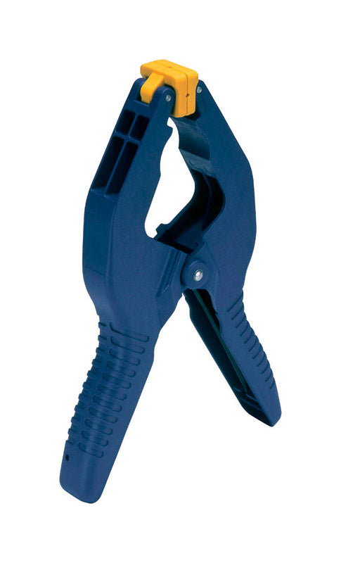 Emery Jensen spring clamp, 3-inch plastic IRW, shown gripping materials, ideal for woodworking and DIY projects.