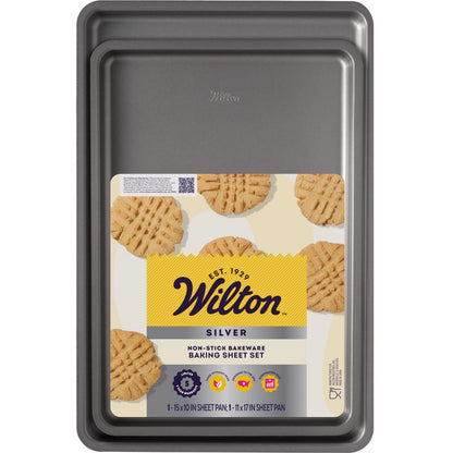 Emery Jensen 2-piece cookie sheet set in stainless and carbon steel, showing two baking sheets with a shiny finish.