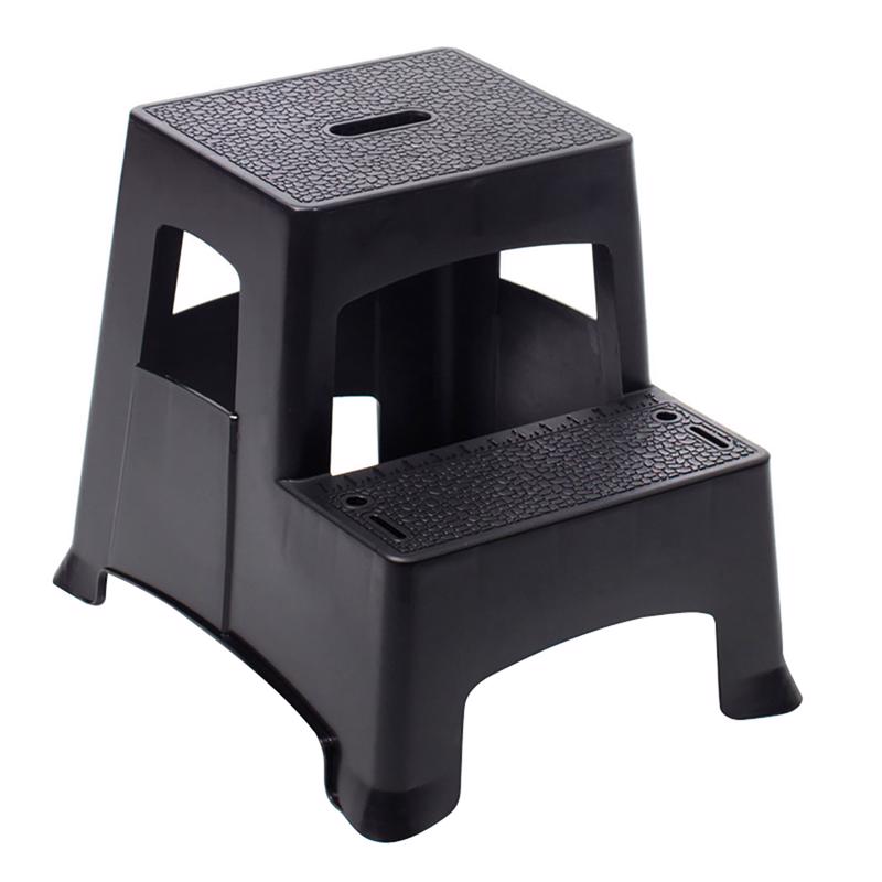 Emery Jensen two-step stool with a sturdy design, black top, and silver metal legs, supporting up to 325 pounds.