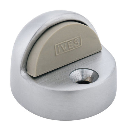Emery Jensen floor mount doorstop in S shape, metal construction, mounted on the floor to prevent door movement.