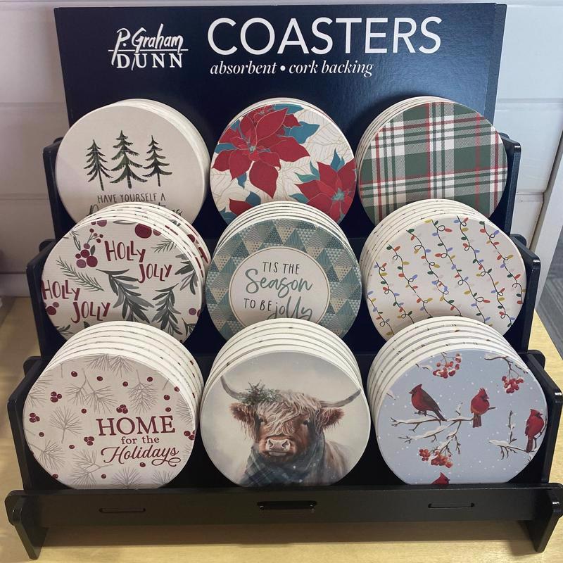 Round Emery Jensen CMAS coaster set, colorful tabletop decor with decorative patterns, perfect for protecting surfaces.
