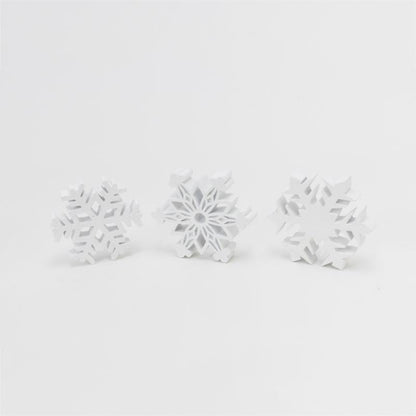 Set of six Emery Jensen tabletop decor snowflake ornaments, festive holiday design for seasonal decoration