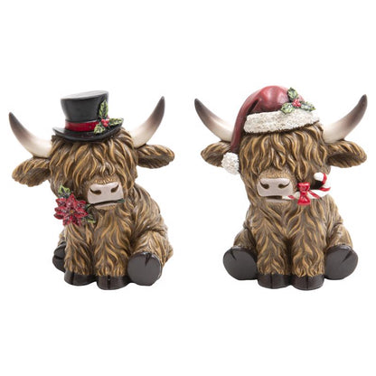 Set of four Emery Jensen tabletop decor cows with rustic resin finish, ideal for farmhouse or country-style home decoration.