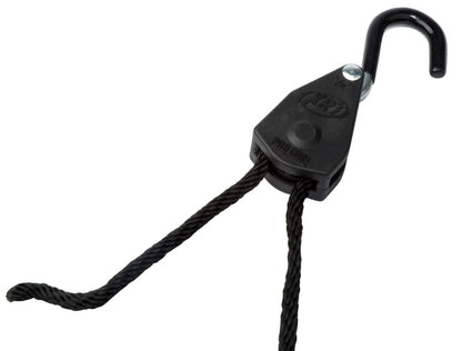 Emery Jensen rope lock tie-down secured on a vehicle, 1/4 inch by 8 feet, used for securing loads during transport.