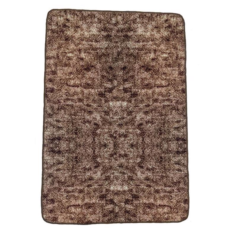 Emery Jensen Uptown Rug Utility Mat in brown, durable carpeting with a textured surface for versatile floor protection.