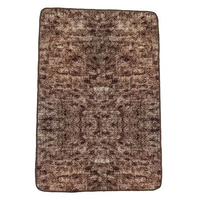 Emery Jensen Uptown Rug Utility Mat in brown, durable carpeting with a textured surface for versatile floor protection.