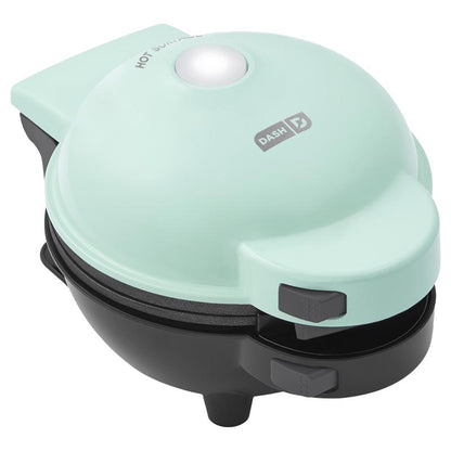 Emery Jensen WFL MKR PLST Aqua 4-inch waffle and crumb cake maker, showing the compact appliance with aqua-colored exterior.
