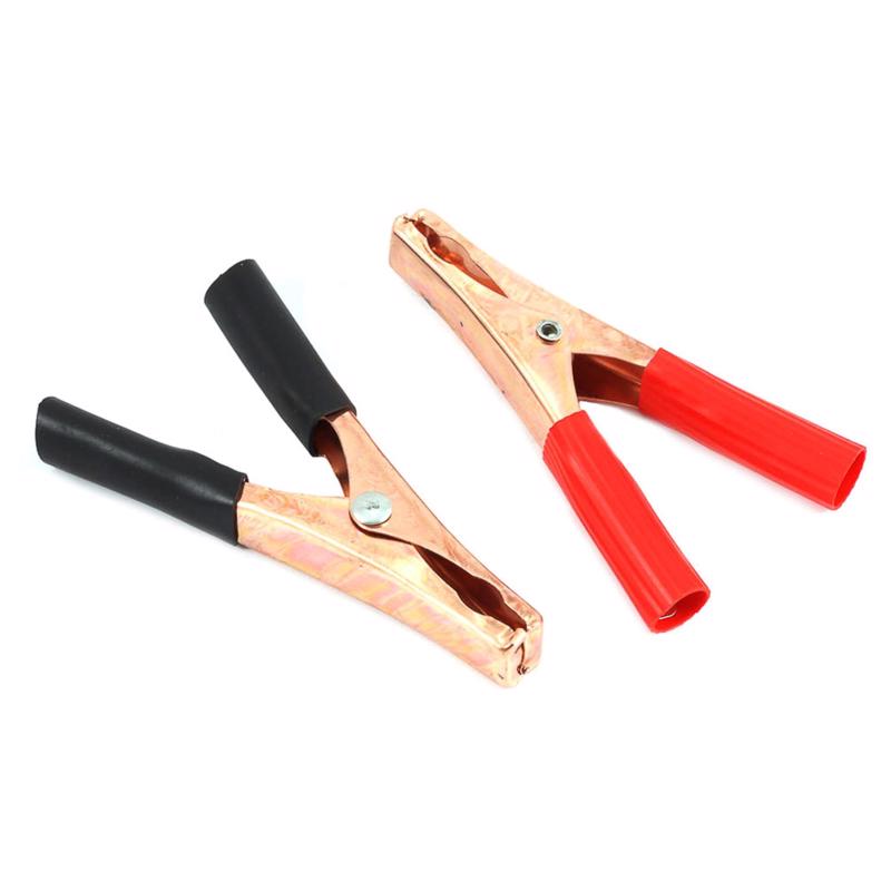 Emery Jensen welding accessories battery charger clamps with alligator-style grips for secure electrical connections.
