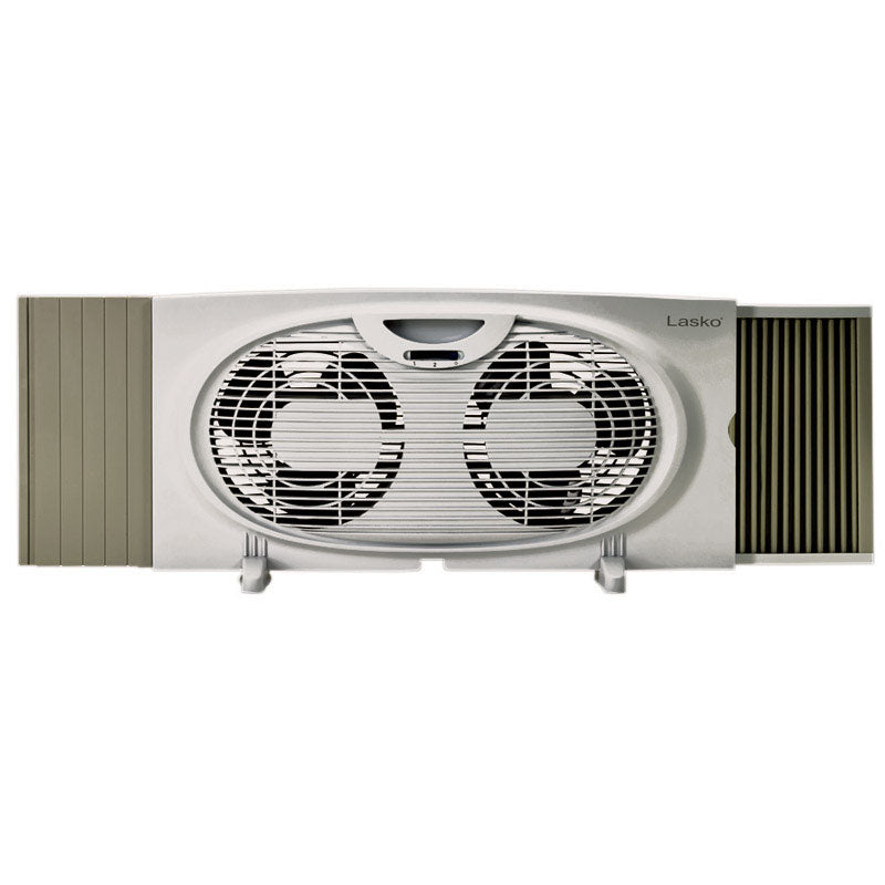 Emery Jensen twin window fan with two-speed settings, installed in a window for efficient air circulation and cooling.