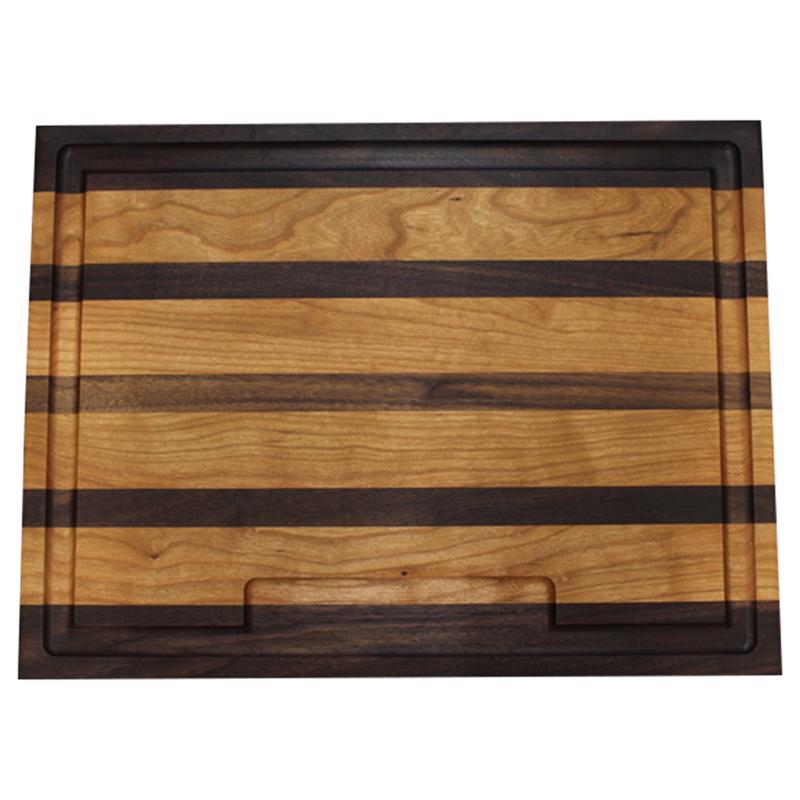 Natural wood chopping board by Emery Jensen, 20 inches long, ideal for food prep and kitchen use.