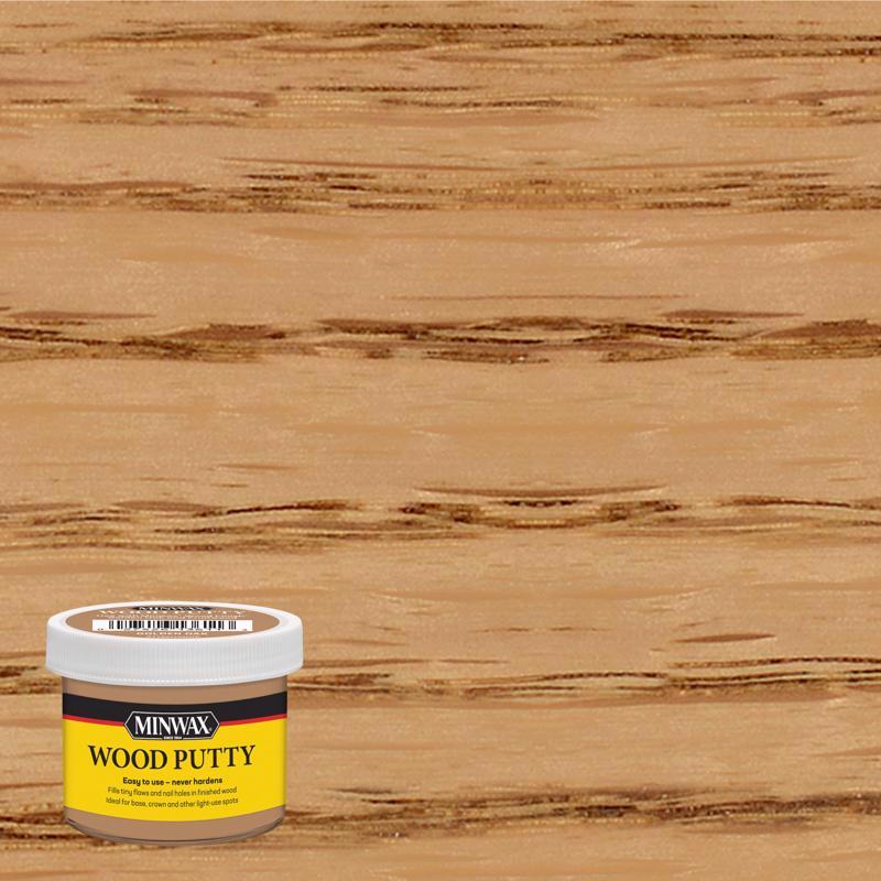 Emery Jensen gold oak wood putty dough in a container, ready for wood repair and filling projects, with a smooth consistency