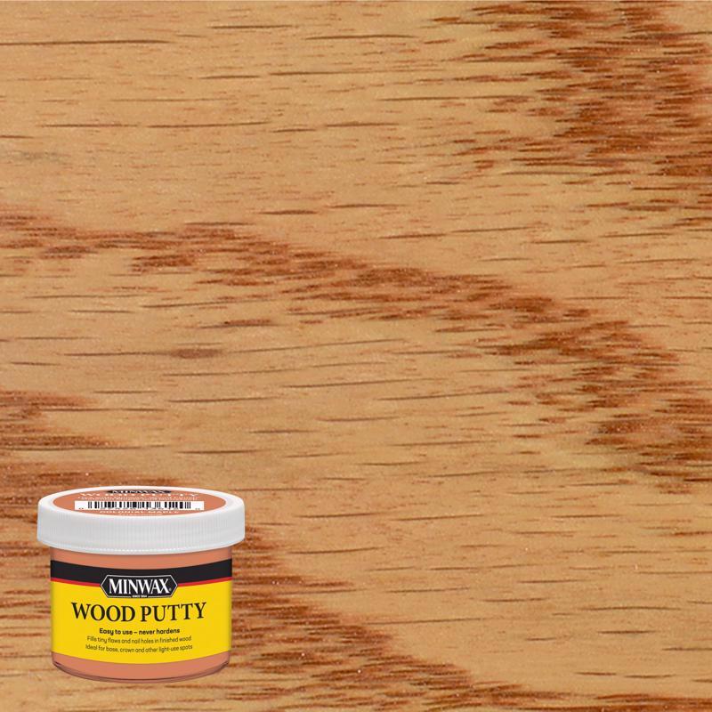 Emery Jensen wood putty dough in Colonial Maple color, ready for filling and repairing wood surfaces.