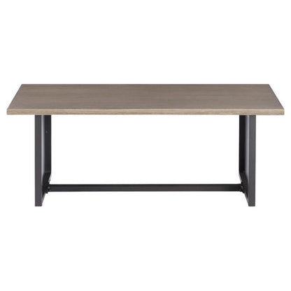Emery Jensen wooden Bree Zee coffee table with a sleek design, showcasing smooth surface and sturdy legs in a modern living room setting.